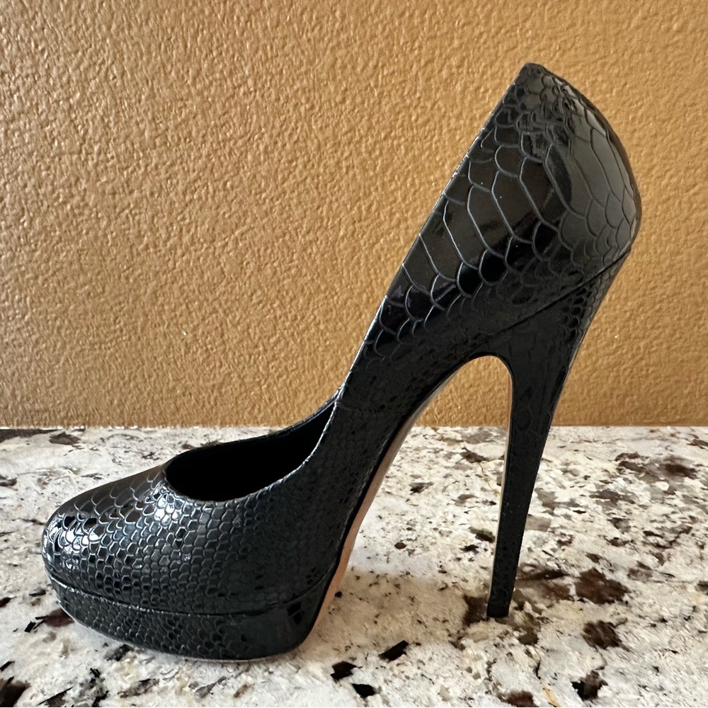 CASADEI black snake platform pump.   Heel tips professionally replaced once.